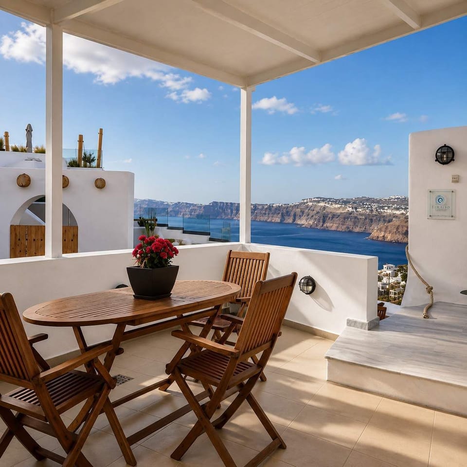 Shaded outdoor dining area overlooking the Aegean Sea