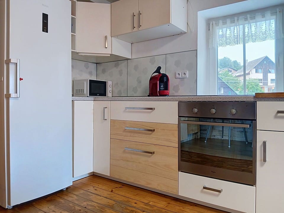Flooring, Cabinetry, Kitchen Appliance, Wood, Major Appliance, Floor, Interior Design, Countertop, Kitchen, Furniture