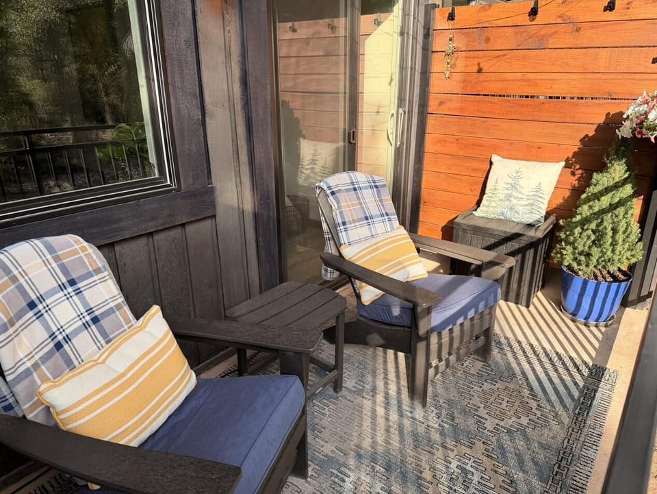 Private riverside seating area—relax and enjoy the water’s flow.