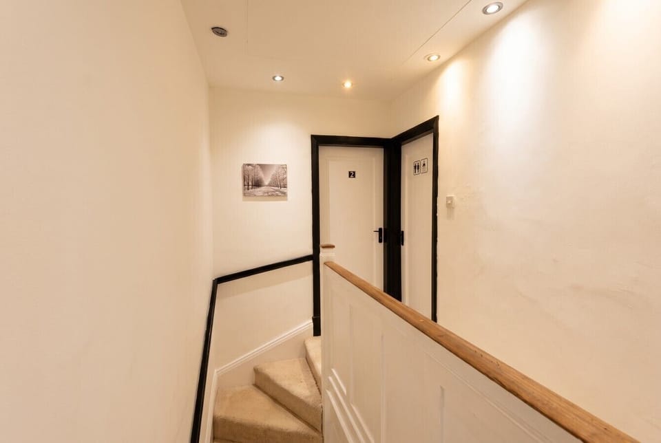 Bright landing guides you between rooms with easy calm