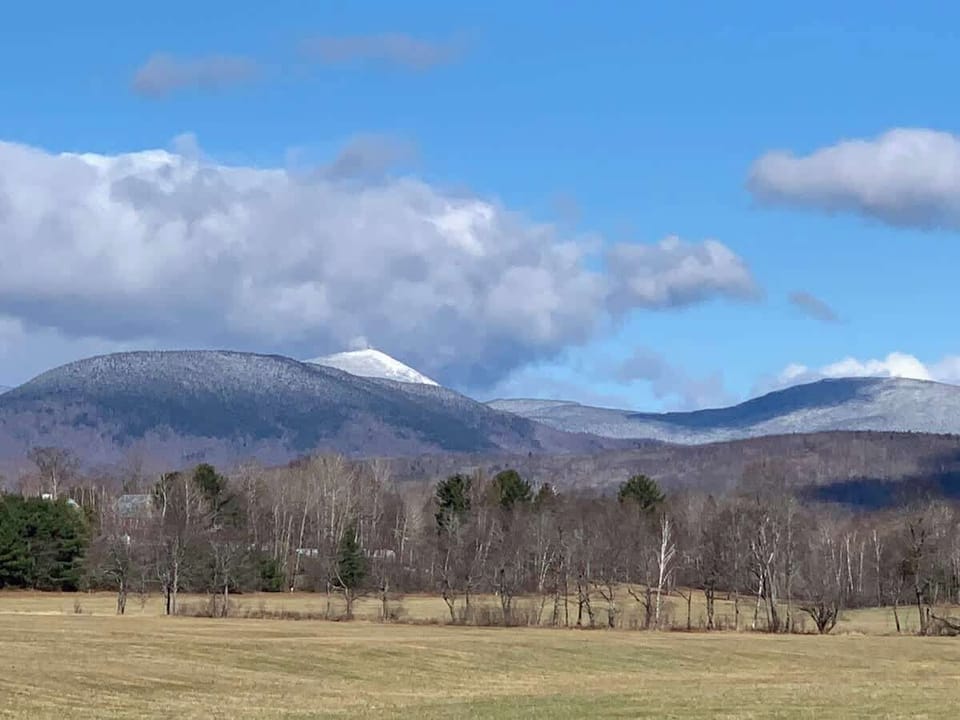 View from trail along Carrabassett River behind the house