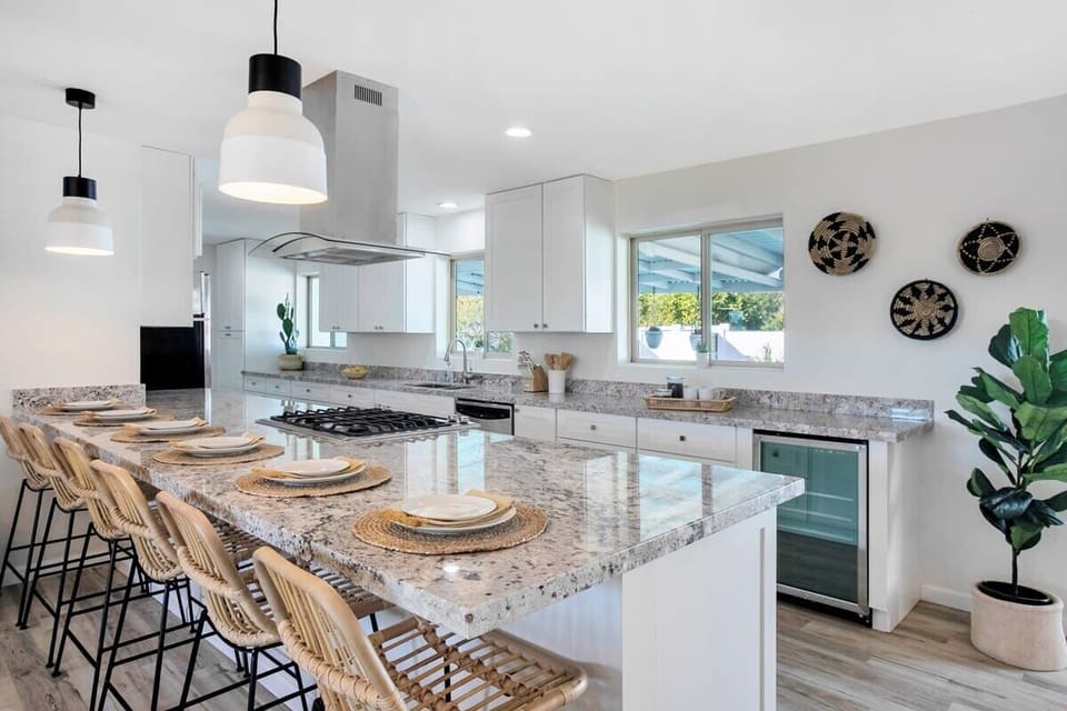 Open Concept Chef's Kitchen | Fully Stocked | Open to Dining | First Floor