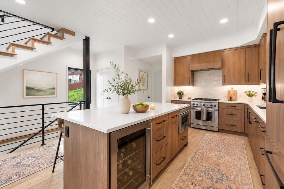 open kitchen with bar seating for 3.