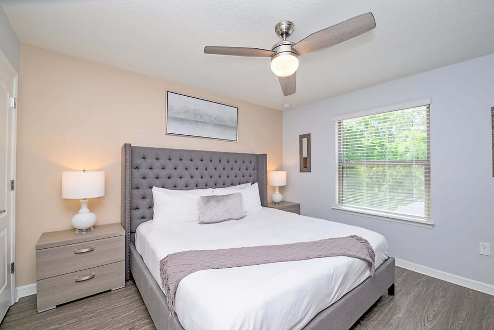 This inviting queen bedroom offers stylish décor, comfortable bedding, natural light, and a peaceful setting for a great night's sleep. Ideal for couples or additional guests.