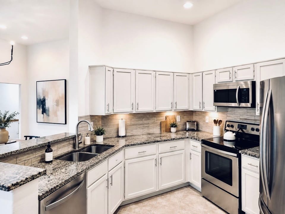 Fully stocked kitchen includes everything you need: Dishware, glassware, utensil