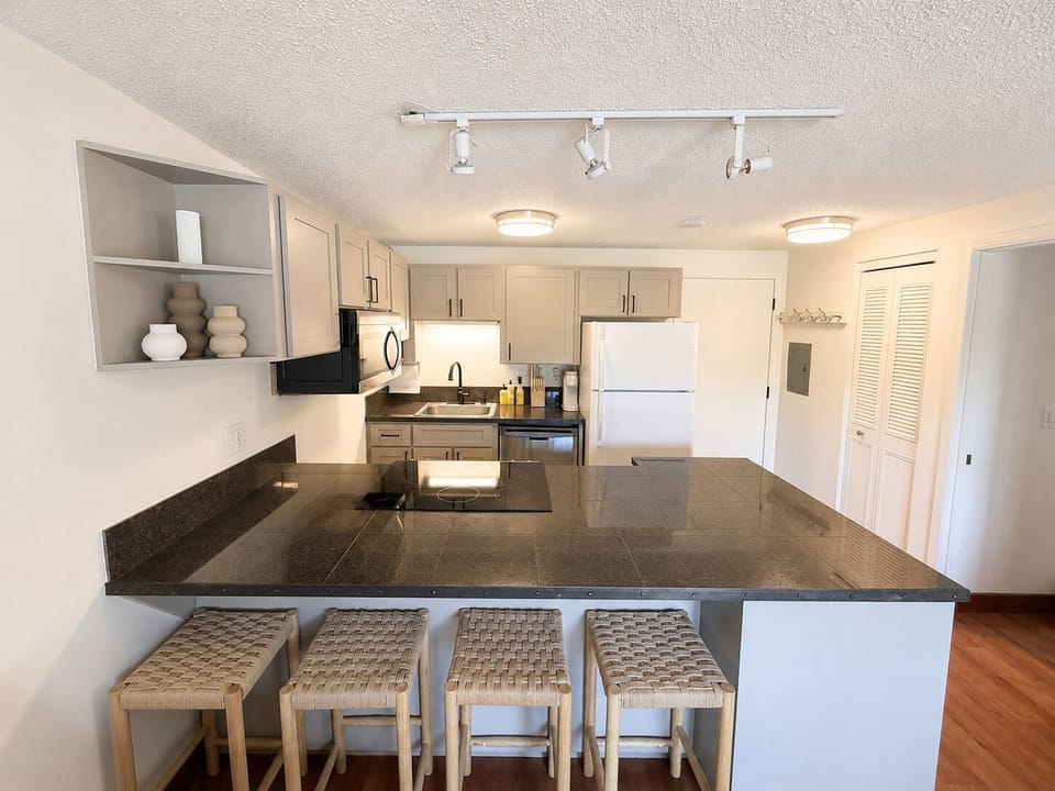 Newly updated kitchen cabinets stocked with all you’ll need!