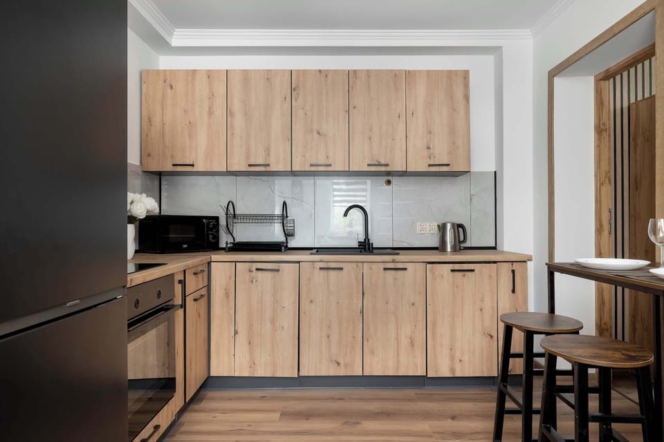 Cook and dine in style with the modern kitchenette and dining area.