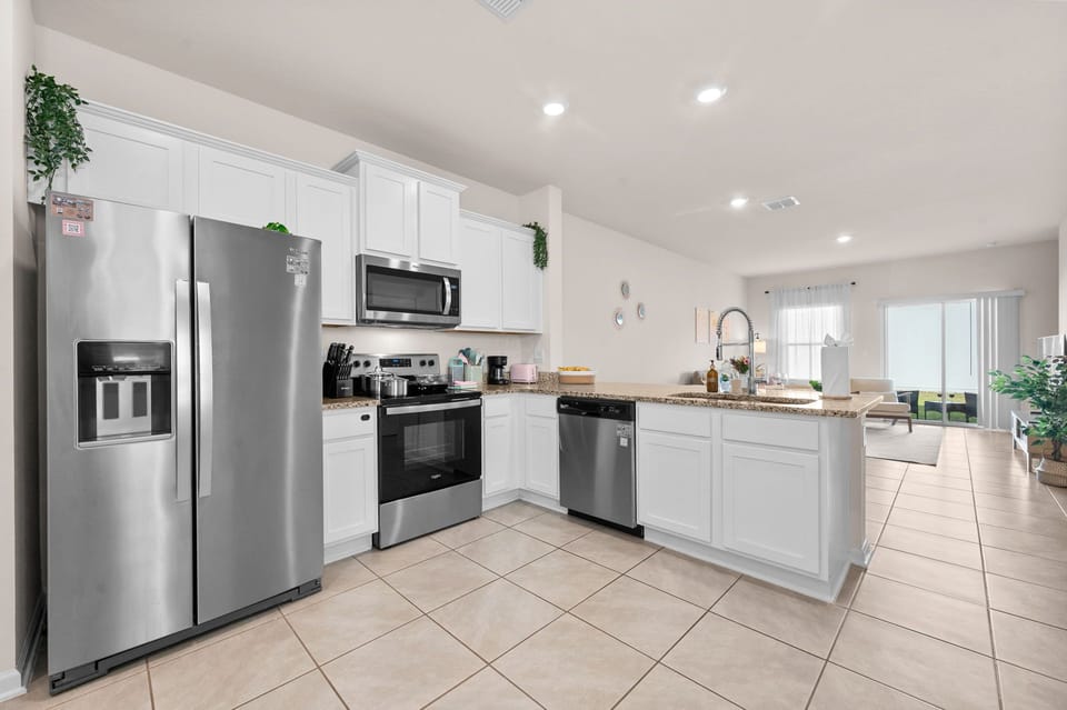 Spacious open-concept kitchen fully equipped