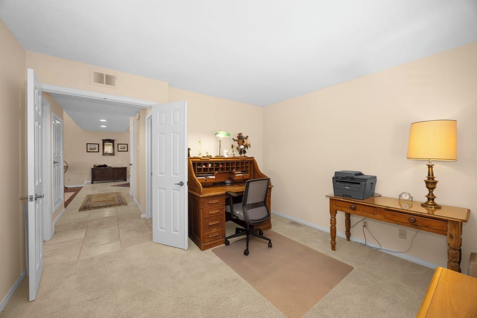 Dedicated home office with a comfortable workspace, perfect for remote work, video meetings, or studying.