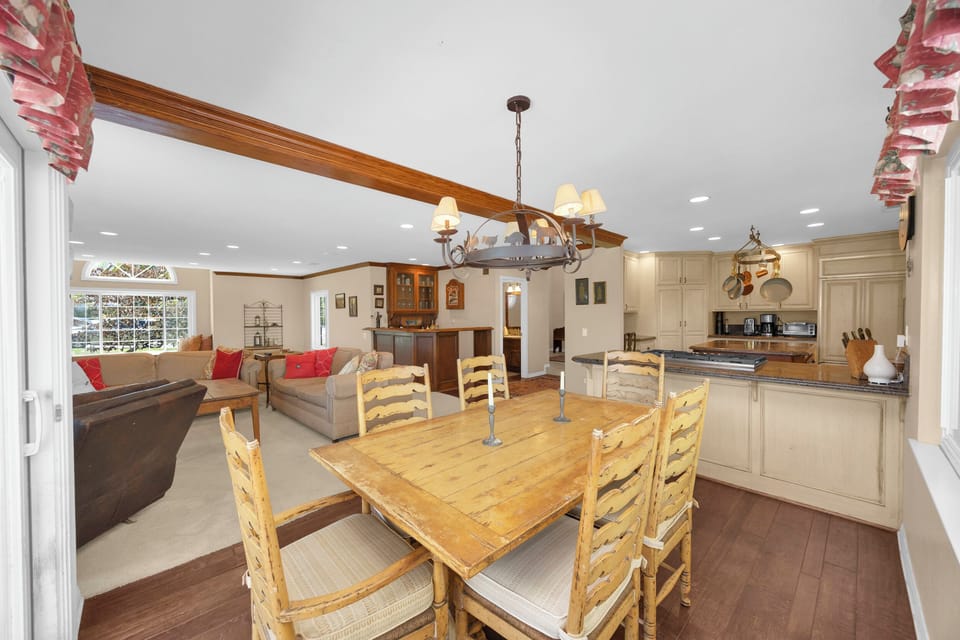 Open breakfast nook connects the gourmet kitchen and family room, creating the perfect gathering space for meals and conversation.