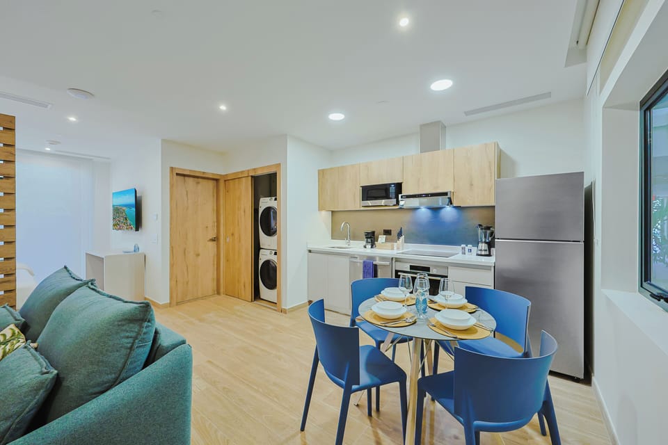 Your open-concept space blends comfort and convenience, with a fully equipped kitchen, cozy dining spot, and relaxing living area—everything you need for effortless, home-away-from-home living.
