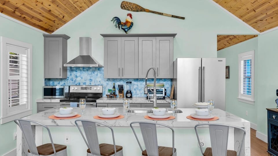 The kitchen bar offers seating for four...