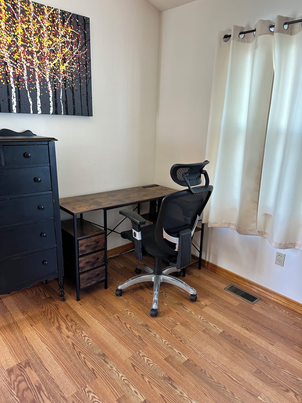 Office desk and chair in case you need to do some work with you stay with us