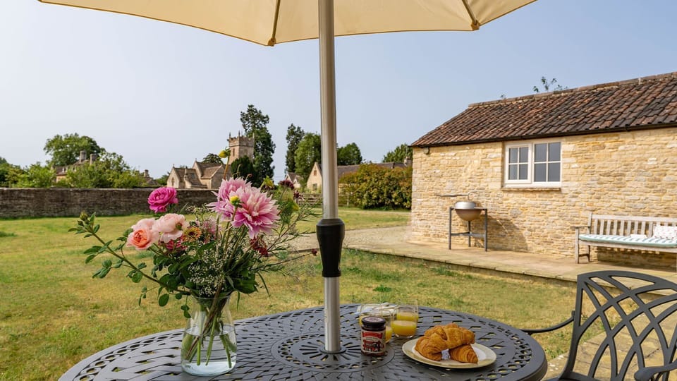 Enjoy breakfast at the outdoor dining table.
