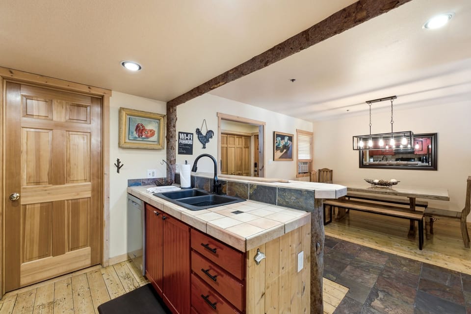 Open kitchen and dining space makes serving drinks and dinner a breeze