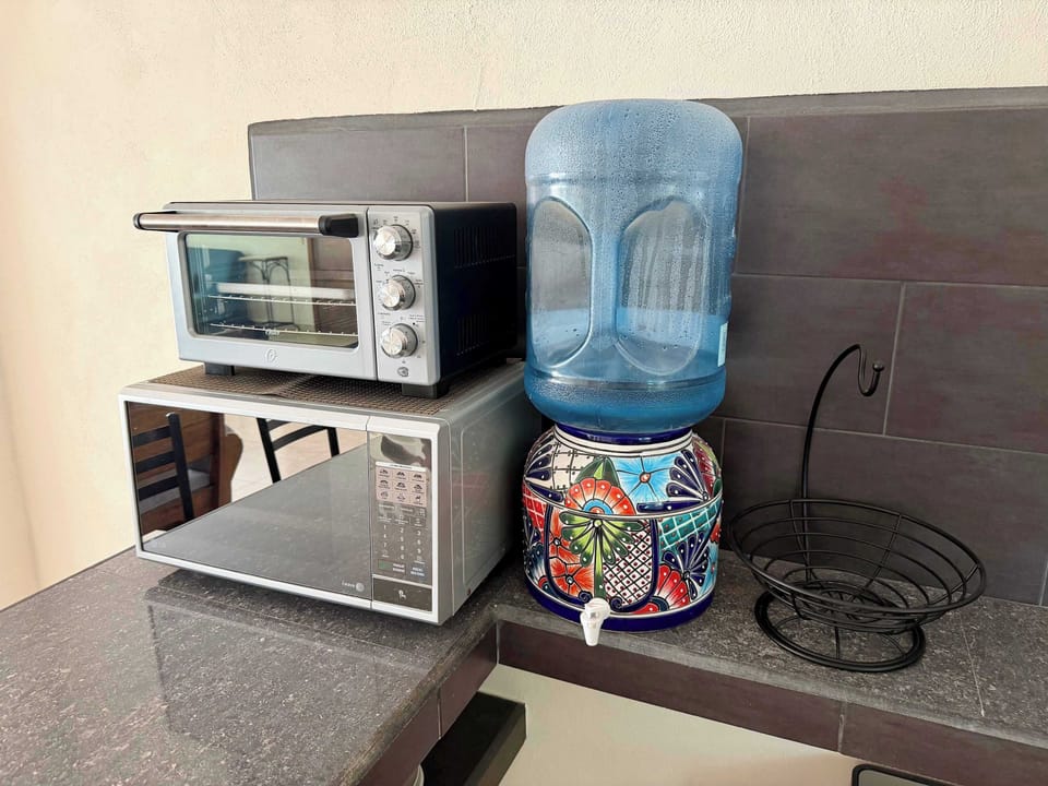 Microwave, toaster oven, and bottled water