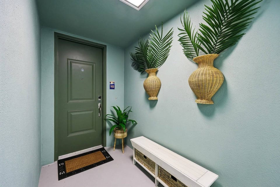 Coastal décor and bright tropical touches welcome you to embark on vacation mode