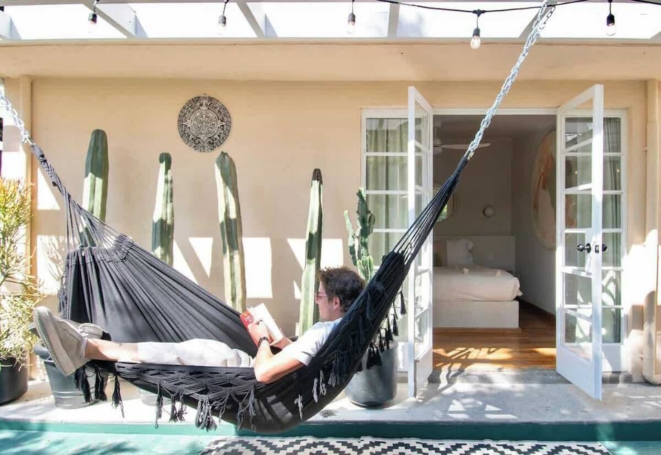 Stretch out in the hammock, enjoy a good book, or simply relax under the open sky. This peaceful corner of the rooftop invites you to slow down and enjoy every moment.