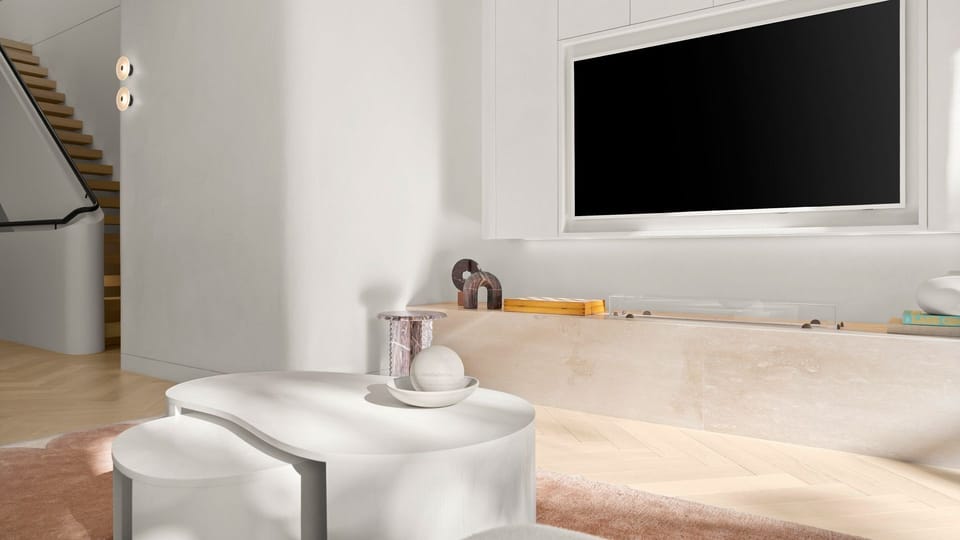 Relaxing media lounge with built-in TV and custom cabinetry.