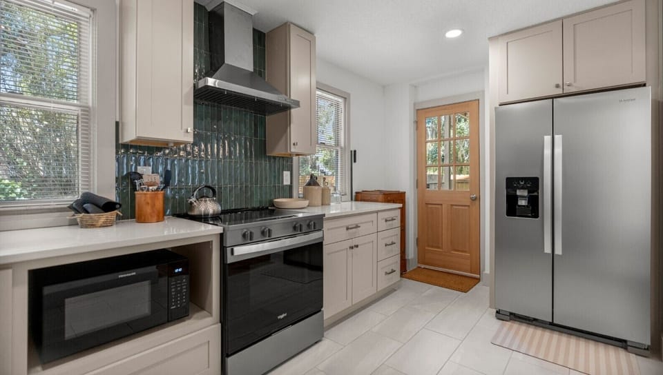 Stainless steel appliances and thoughtful touches throughout.