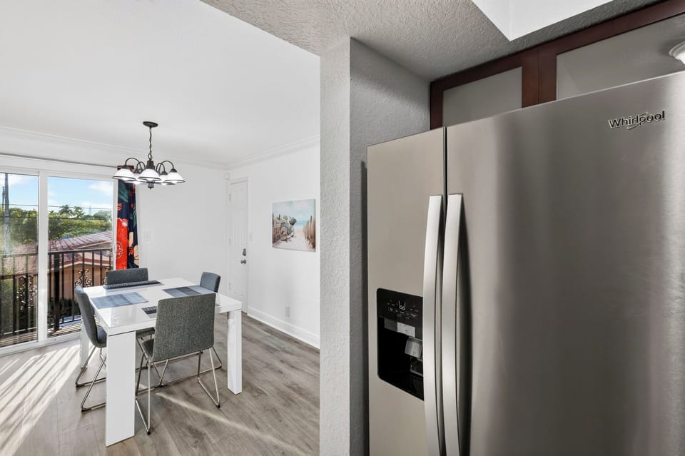 Full kitchen with granite counters, stainless appliances, and everything needed for easy meals at home.