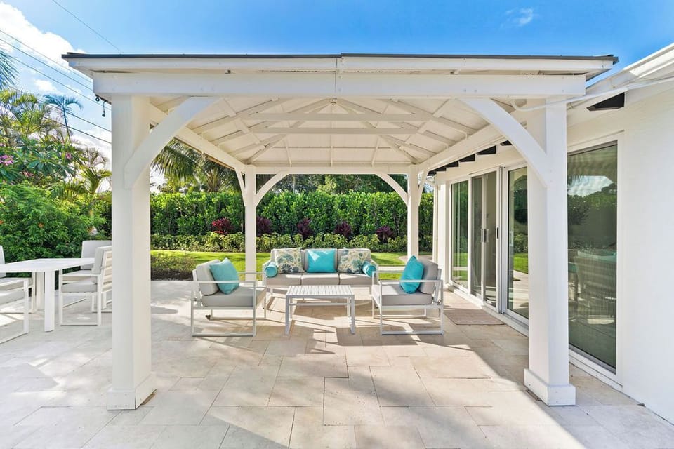 Shaded poolside perfection. Lounge under the gazebo and let the vacation breeze wash over you. 🍹🛋️🍃