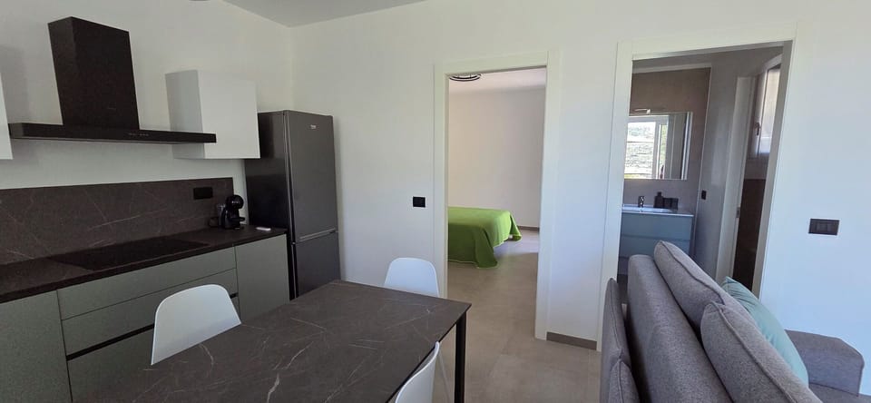 Flooring, Furniture, Interior Design, Wood, Floor, Kitchen, Countertop, Major Appliance, Room, Lighting