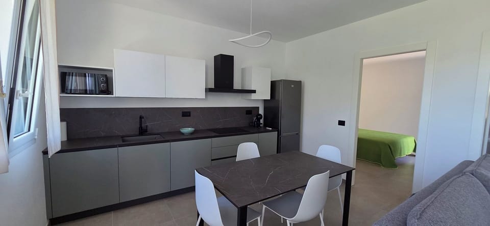 Furniture, Interior Design, Flooring, Kitchen, Floor, Major Appliance, Lighting, Countertop, Kitchen Appliance, Room
