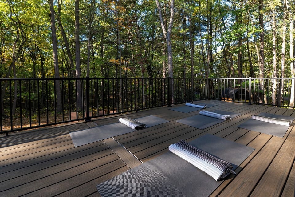 An expansive deck surrounded by nature, made for slow mornings & mindful moments