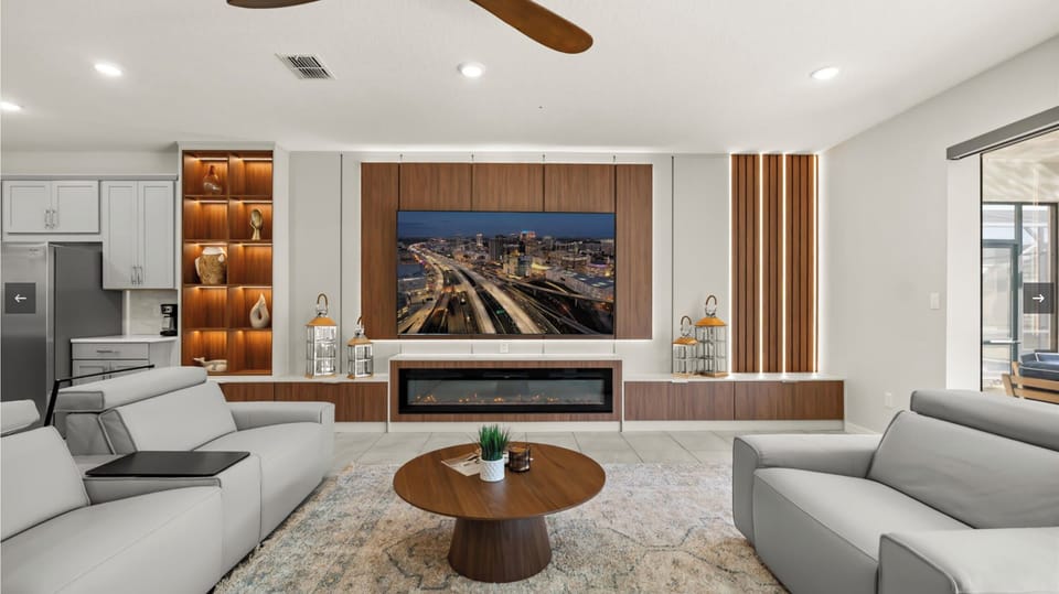 Modern fireplace and cozy seating.
