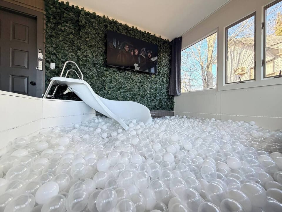 Ball pit with slide, TV and LED lights. Play your favorite music and enjoy!