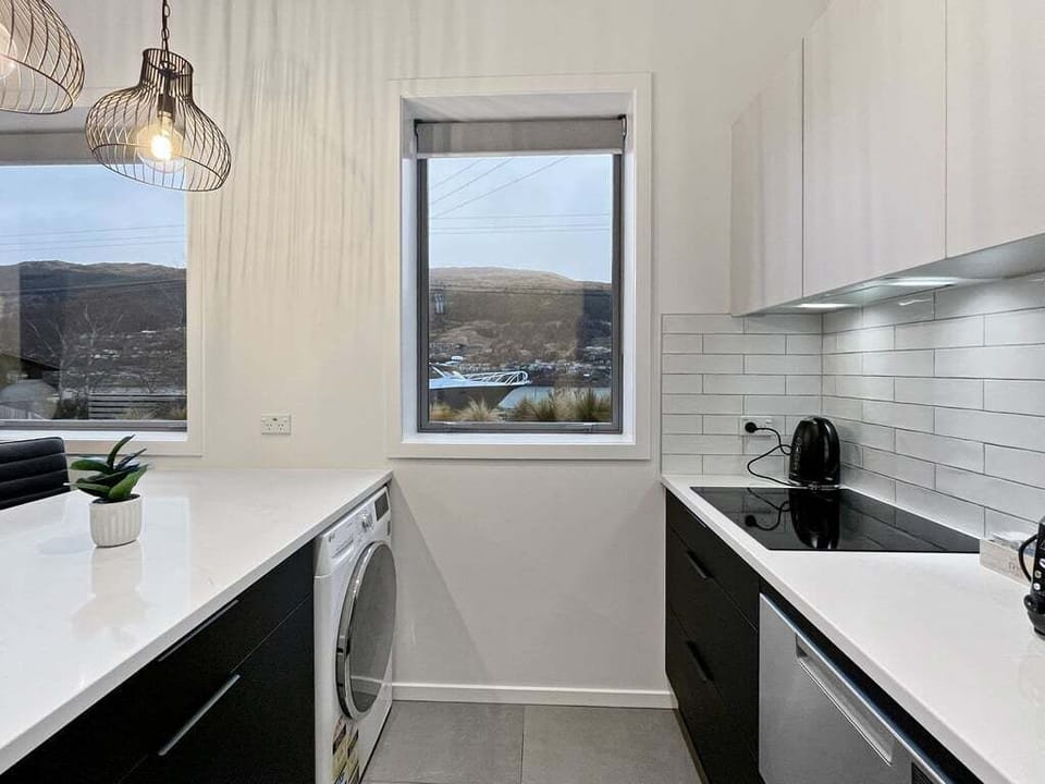 Bright and functional kitchen with quality appliances and plenty of bench space.
