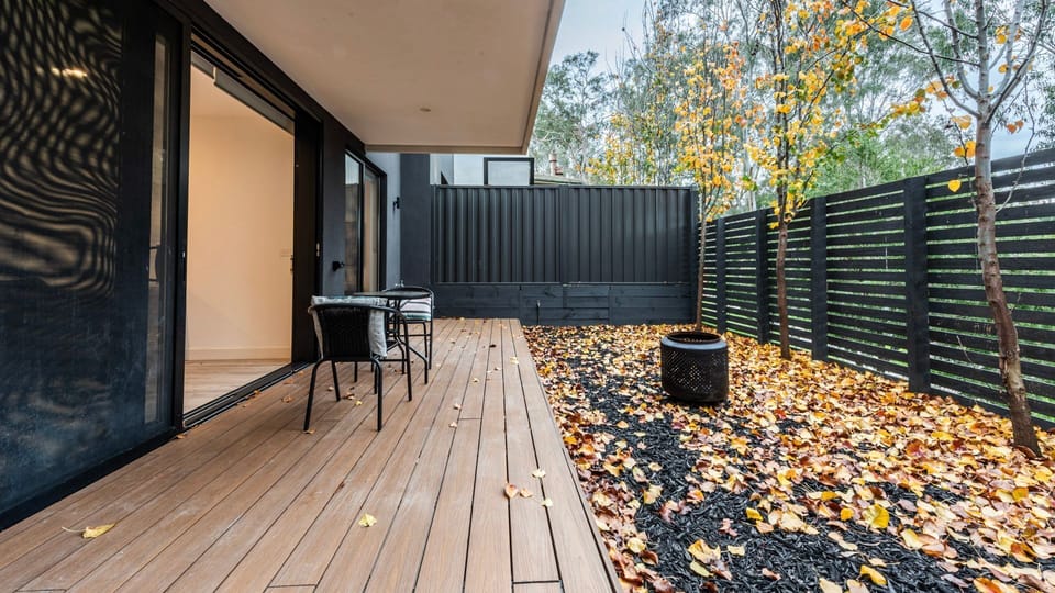 Enjoy the peaceful leafy surroundings from the spacious entertaining deck.