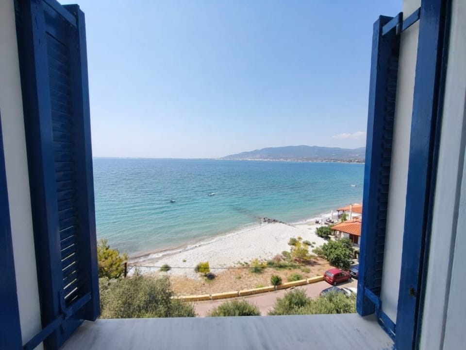 beach visible, interior, beach ocean view, summer, outdoor, body of water