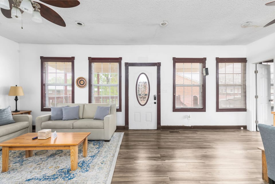 Step inside and feel the warmth right away, where rich wood tones and classic details set the tone for a comfortable, character-filled stay from the very first moment.