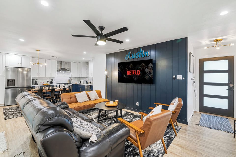 Stylish space with sleek furniture, perfect for movie nights or gathering with friends!