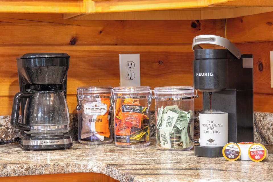 Start your mornings right with complimentary coffee and tea, plus a Keurig brewer for your favorite blend. Everything you need for a perfect cup is thoughtfully arranged and ready for you.