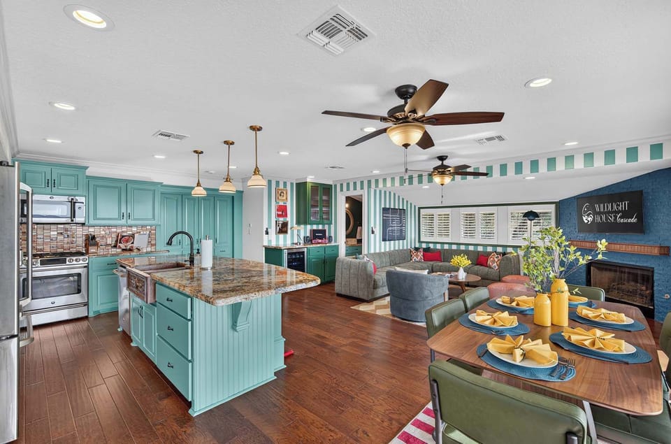 Bring everyone together in an expansive open-concept living area where the kitchen, dining room, and cozy lounge seamlessly flow into one another.
