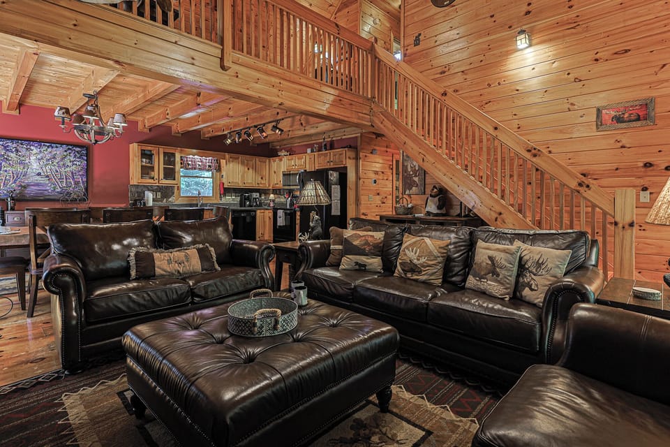 Warm wood finishes and vaulted ceilings create a classic cabin atmosphere.