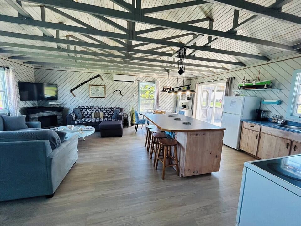 Spacious Living Room with Full Kitchen.