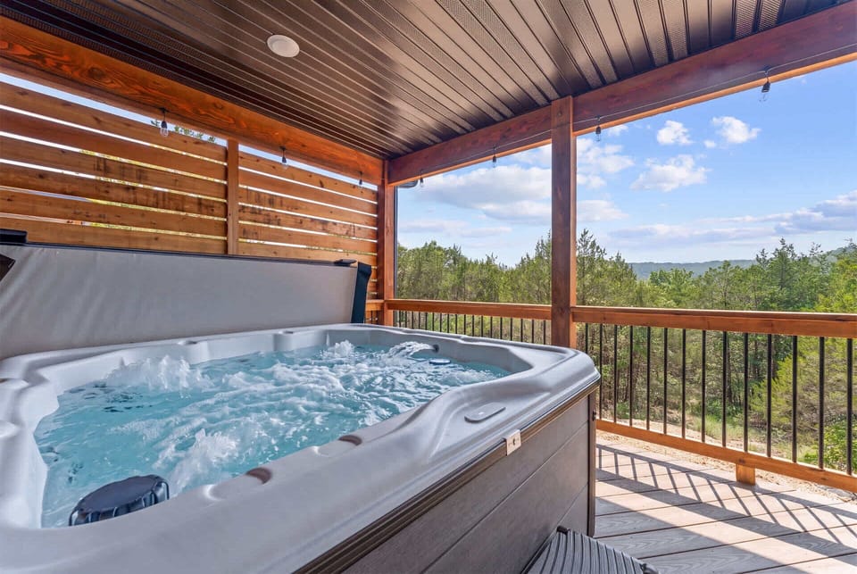 Bask in bubbling bliss with serene views in the private hot tub​