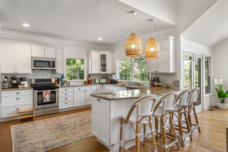 Well-equipped kitchen with generous island seating.