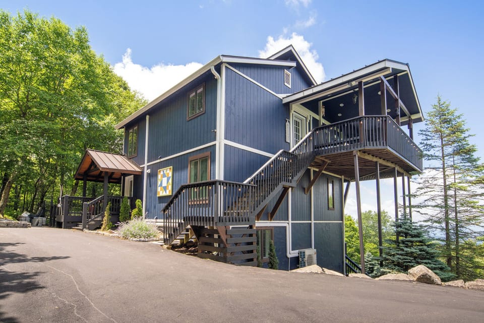 Driveway is long and steep to this beautiful home.  4-wheel drive is recommended during the winter.