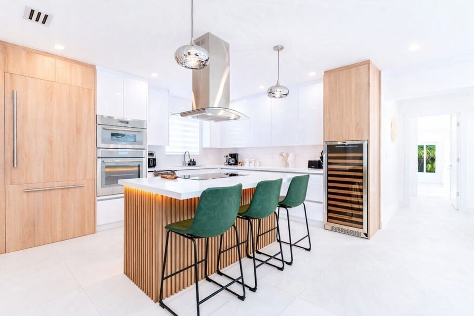 Designer Chef’s Kitchen with Wine Fridge & Island Seating