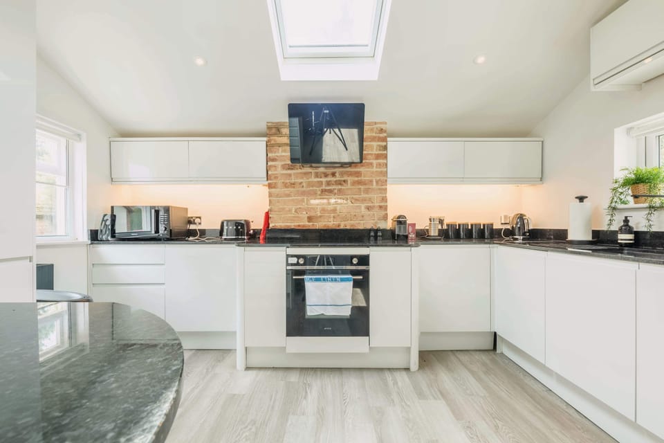 Cook with ease in the fully equipped kitchen.