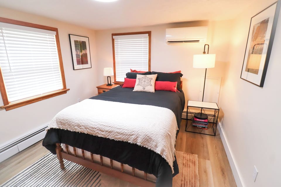 Comfortable Full bedroom designed for a relaxing night's sleep.
