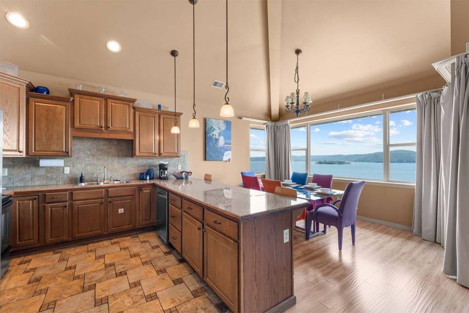 The open kitchen offers ample space & all the comforts of home​