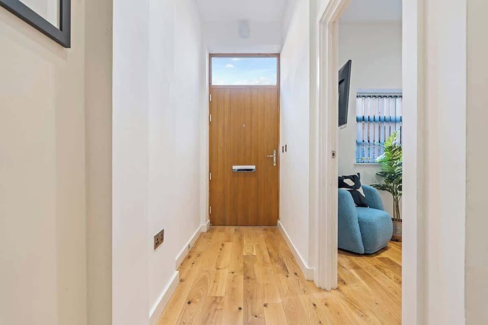 Clean architectural lines & warm wood floors.