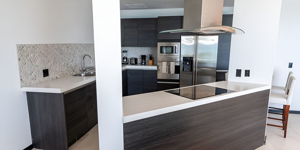 Cook effortlessly in a sleek kitchen with premium appliances.