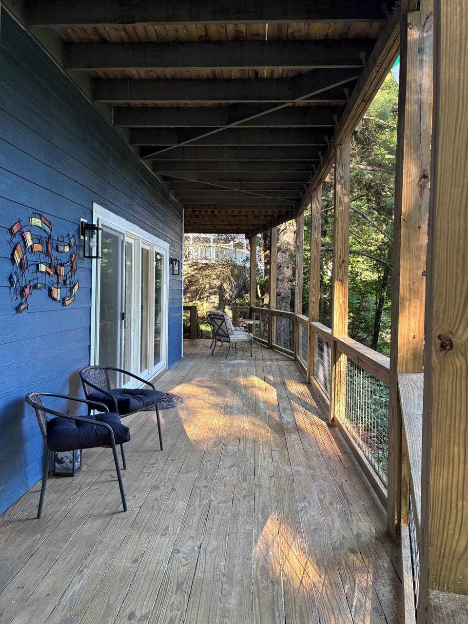 Downstairs deck with seating areas and view of Chatahoochee-Oconee Nat'l Forest.